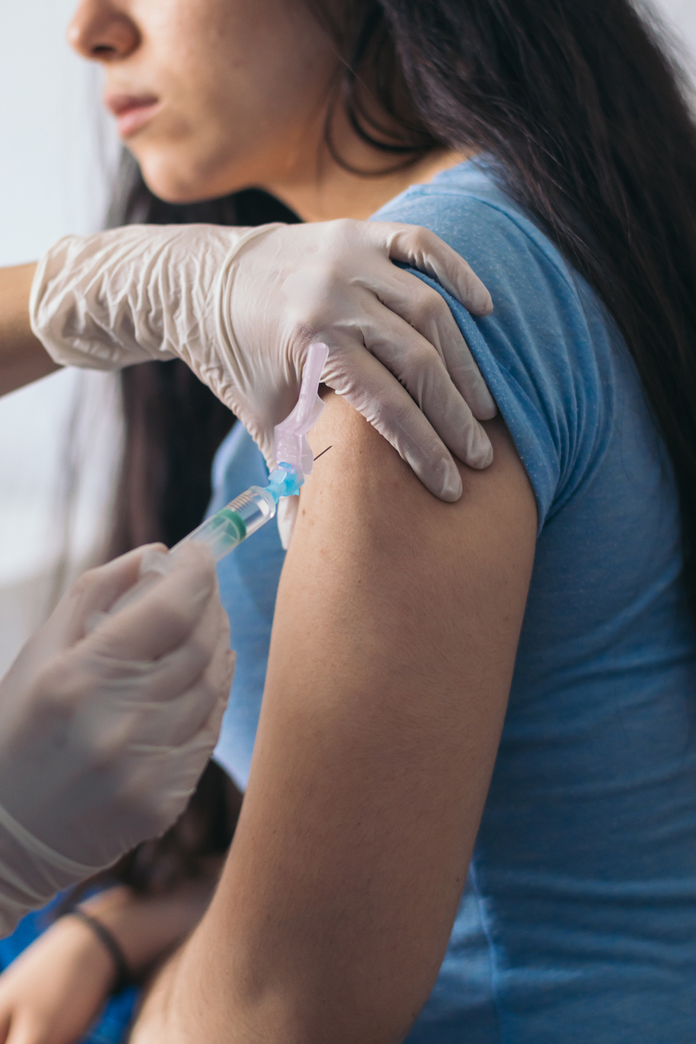 Vaccinering på en person